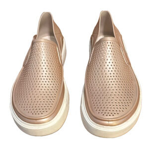 CROCS Citilane metallic Slip-On Shoes in rose gold.